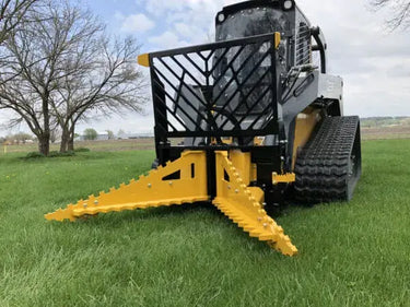 The image shows a Dominator Tree Puller being used in its intended environment. It is a powerful and versatile tool that can be used for a variety of tasks, such as clearing land, removing trees, and preparing for construction work.